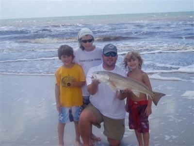 A gorgeous and huge RED caught with a shrimp, from the shore in front of Two Palms just after a Tropical Storm August, 2009. Brian, his wife, and 5 boys from Jacksonville were superstars in preventing water from destroying the home.